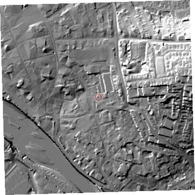 Shaded relief map of the ground around EX328JN, computed from Environment Agency LiDAR. The ground here sits at about 9 m above sea level and falls 37 m across the surrounding 800 m. Surface water reaching this point runs off ground lying to the east-north-east, 7.0 m higher.