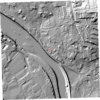 Shaded relief map of the ground around EX328LT, computed from Environment Agency LiDAR. The ground here sits at about 7 m above sea level and falls 31 m across the surrounding 800 m. Surface water reaching this point runs off ground lying to the north-east, 2.6 m higher.