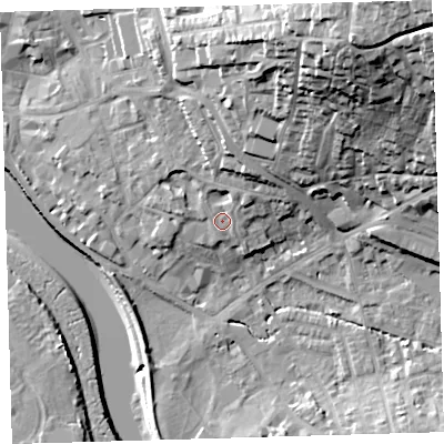 Shaded relief map of the ground around EX329HE, computed from Environment Agency LiDAR. The ground here sits at about 9 m above sea level and falls 43 m across the surrounding 800 m. Surface water reaching this point runs off ground lying to the north-north-east, 2.4 m higher.