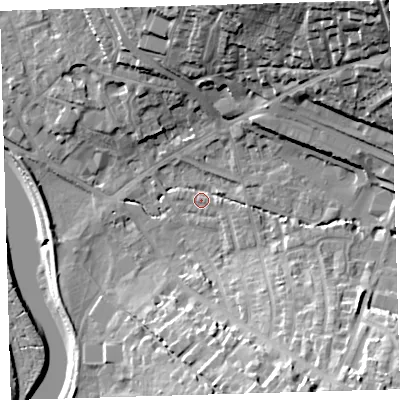 Shaded relief map of the ground around EX329JW, computed from Environment Agency LiDAR. The ground here sits at about 5 m above sea level and falls 38 m across the surrounding 800 m. Surface water reaching this point runs off ground lying to the north-east, 34.7 m higher.