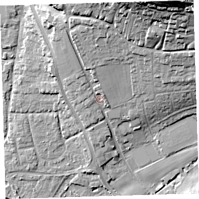 Shaded relief map of the ground around EX332BT, computed from Environment Agency LiDAR. The ground here sits at about 13 m above sea level and falls 44 m across the surrounding 800 m. Surface water reaching this point runs off ground lying to the north, 16.1 m higher.