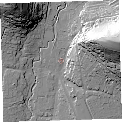 Shaded relief map of the ground around EX332EB, computed from Environment Agency LiDAR. The ground here sits at about 13 m above sea level and falls 85 m across the surrounding 800 m. Surface water reaching this point runs off ground lying to the east-north-east, 65.9 m higher.