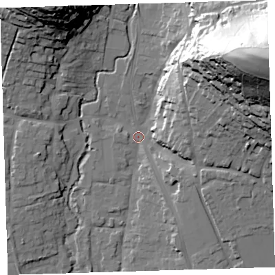 Shaded relief map of the ground around EX332JG, computed from Environment Agency LiDAR. The ground here sits at about 12 m above sea level and falls 84 m across the surrounding 800 m. Surface water reaching this point runs off ground lying to the east-north-east, 80.9 m higher.