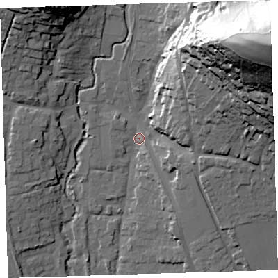 Shaded relief map of the ground around EX332JJ, computed from Environment Agency LiDAR. The ground here sits at about 12 m above sea level and falls 85 m across the surrounding 800 m. Surface water reaching this point runs off ground lying to the north-east, 81.8 m higher.