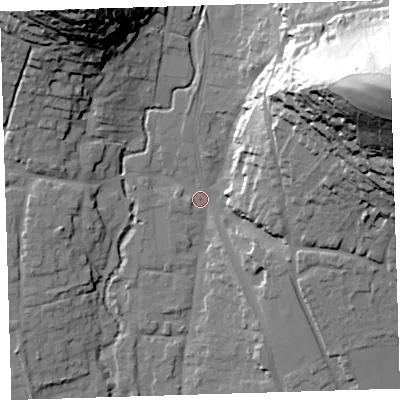 Shaded relief map of the ground around EX332JQ, computed from Environment Agency LiDAR. The ground here sits at about 12 m above sea level and falls 83 m across the surrounding 800 m. Surface water reaching this point runs off ground lying to the east-north-east, 80.1 m higher.