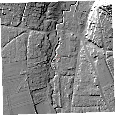 Shaded relief map of the ground around EX332PS, computed from Environment Agency LiDAR. The ground here sits at about 11 m above sea level and falls 60 m across the surrounding 800 m. Surface water reaching this point runs off ground lying to the north-north-west, 17.1 m higher.