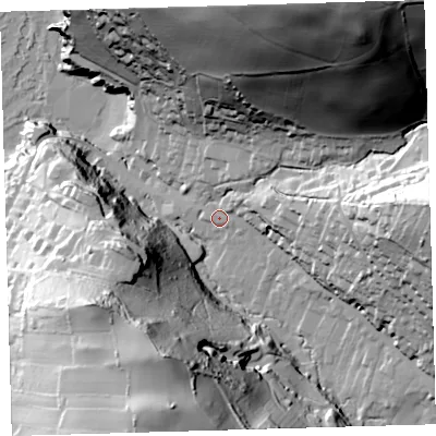 Shaded relief map of the ground around EX340AL, computed from Environment Agency LiDAR. The ground here sits at about 14 m above sea level and falls 115 m across the surrounding 800 m. Surface water reaching this point runs off ground lying to the east-north-east, 11.0 m higher.