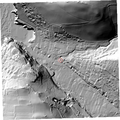 Shaded relief map of the ground around EX340DB, computed from Environment Agency LiDAR. The ground here sits at about 15 m above sea level and falls 117 m across the surrounding 800 m. Surface water reaching this point runs off ground lying to the north-north-east, 106.5 m higher.