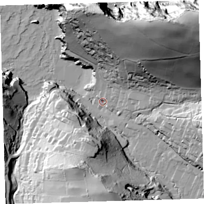 Shaded relief map of the ground around EX340DH, computed from Environment Agency LiDAR. The ground here sits at about 9 m above sea level and falls 117 m across the surrounding 800 m. Surface water reaching this point runs off ground lying to the north-east, 108.4 m higher.