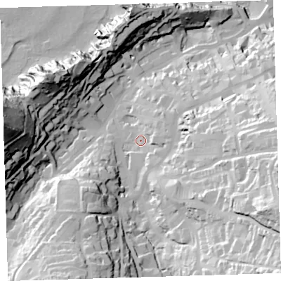 Shaded relief map of the ground around EX348AE, computed from Environment Agency LiDAR. The ground here sits at about 21 m above sea level and falls 83 m across the surrounding 800 m. Surface water reaching this point runs off ground lying to the east, 9.5 m higher.