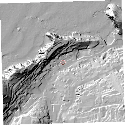 Shaded relief map of the ground around EX348AR, computed from Environment Agency LiDAR. The ground here sits at about 13 m above sea level and falls 73 m across the surrounding 800 m. Surface water reaching this point runs off ground lying to the south-east, 62.3 m higher.