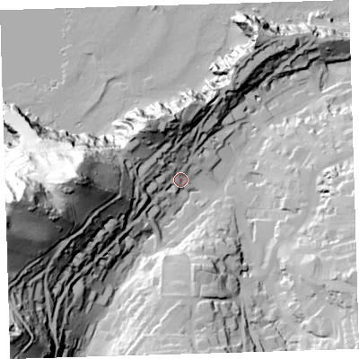 Shaded relief map of the ground around EX348AY, computed from Environment Agency LiDAR. The ground here sits at about 23 m above sea level and falls 118 m across the surrounding 800 m. Surface water reaching this point runs off ground lying to the west, 77.5 m higher.