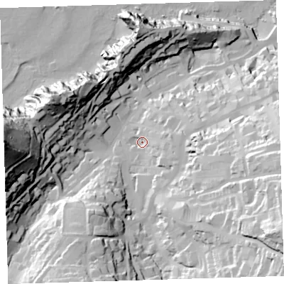 Shaded relief map of the ground around EX348BT, computed from Environment Agency LiDAR. The ground here sits at about 18 m above sea level and falls 91 m across the surrounding 800 m. Surface water reaching this point runs off ground lying to the east-south-east, 26.3 m higher.