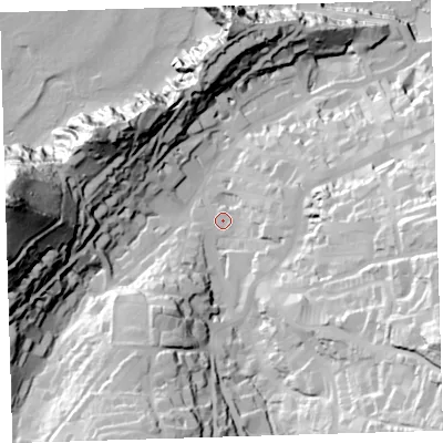 Shaded relief map of the ground around EX348BU, computed from Environment Agency LiDAR. The ground here sits at about 18 m above sea level and falls 99 m across the surrounding 800 m. Surface water reaching this point runs off ground lying to the east-south-east, 57.0 m higher.