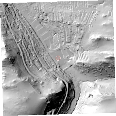 Shaded relief map of the ground around EX348ES, computed from Environment Agency LiDAR. The ground here sits at about 57 m above sea level and falls 139 m across the surrounding 800 m. Surface water reaching this point runs off ground lying to the south-south-west, 25.3 m higher.