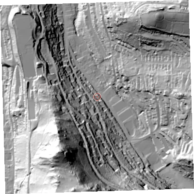 Shaded relief map of the ground around EX348EU, computed from Environment Agency LiDAR. The ground here sits at about 52 m above sea level and falls 127 m across the surrounding 800 m. Surface water reaching this point runs off ground lying to the south-south-east, 22.7 m higher.