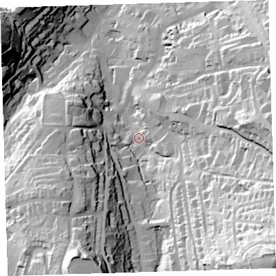 Shaded relief map of the ground around EX348HD, computed from Environment Agency LiDAR. The ground here sits at about 26 m above sea level and falls 100 m across the surrounding 800 m. Surface water reaching this point runs off ground lying to the south-east, 91.9 m higher.