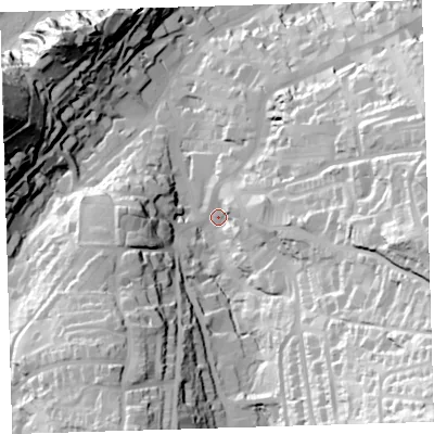 Shaded relief map of the ground around EX348JY, computed from Environment Agency LiDAR. The ground here sits at about 23 m above sea level and falls 100 m across the surrounding 800 m. Surface water reaching this point runs off ground lying to the south-east, 82.1 m higher.