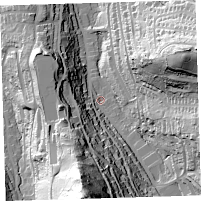 Shaded relief map of the ground around EX348QB, computed from Environment Agency LiDAR. The ground here sits at about 41 m above sea level and falls 128 m across the surrounding 800 m. Surface water reaching this point runs off ground lying to the south, 115.1 m higher.