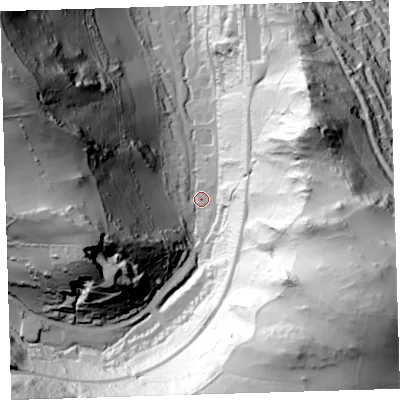 Shaded relief map of the ground around EX348RE, computed from Environment Agency LiDAR. The ground here sits at about 62 m above sea level and falls 135 m across the surrounding 800 m. Surface water reaching this point runs off ground lying to the south-east, 119.9 m higher.