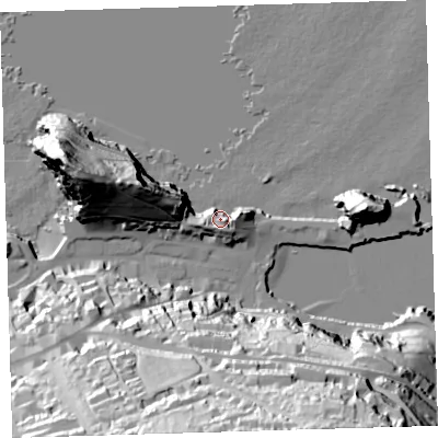 Shaded relief map of the ground around EX349BP, computed from Environment Agency LiDAR. The ground here sits at about 11 m above sea level and falls 77 m across the surrounding 800 m. Surface water reaching this point runs off ground lying to the east-north-east, 12.6 m higher.