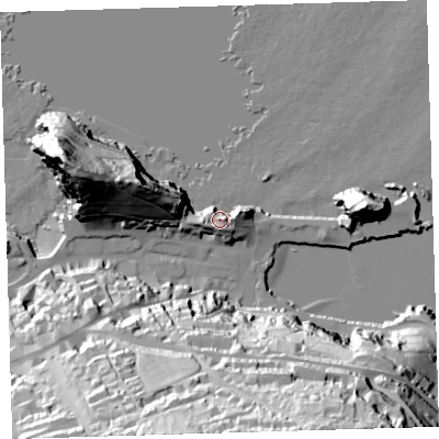 Shaded relief map of the ground around EX349BT, computed from Environment Agency LiDAR. The ground here sits at about 13 m above sea level and falls 77 m across the surrounding 800 m. Surface water reaching this point runs off ground lying to the east-north-east, 12.6 m higher.