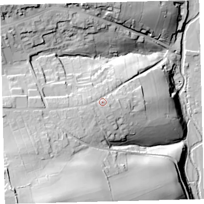 Shaded relief map of the ground around EX364DA, computed from Environment Agency LiDAR. The ground here sits at about 130 m above sea level and falls 60 m across the surrounding 800 m. Surface water reaching this point runs off ground lying to the south-west, 6.4 m higher.