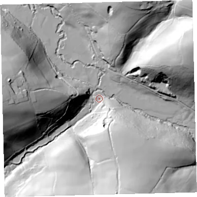 Shaded relief map of the ground around EX364JL, computed from Environment Agency LiDAR. The ground here sits at about 85 m above sea level and falls 75 m across the surrounding 800 m. Surface water reaching this point runs off ground lying to the south-south-east, 60.5 m higher.