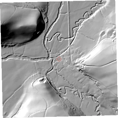 Shaded relief map of the ground around EX364LG, computed from Environment Agency LiDAR. The ground here sits at about 77 m above sea level and falls 58 m across the surrounding 800 m. Surface water reaching this point runs off ground lying to the east-south-east, 9.4 m higher.