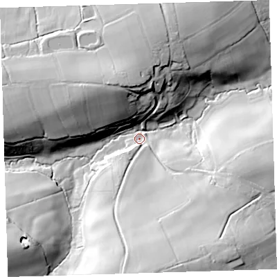 Shaded relief map of the ground around EX388QB, computed from Environment Agency LiDAR. The ground here sits at about 86 m above sea level and falls 38 m across the surrounding 800 m. Surface water reaching this point runs off ground lying to the south, 32.8 m higher.