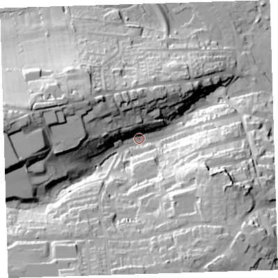 Shaded relief map of the ground around EX393JW, computed from Environment Agency LiDAR. The ground here sits at about 14 m above sea level and falls 49 m across the surrounding 800 m. Surface water reaching this point runs off ground lying to the west, 38.7 m higher.