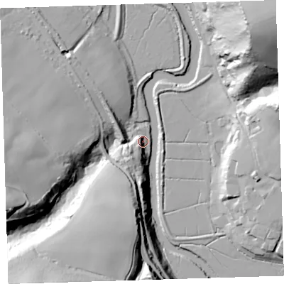 Shaded relief map of the ground around EX395JD, computed from Environment Agency LiDAR. The ground here sits at about 7 m above sea level and falls 72 m across the surrounding 800 m. Surface water reaching this point runs off ground lying to the south-west, 57.5 m higher.
