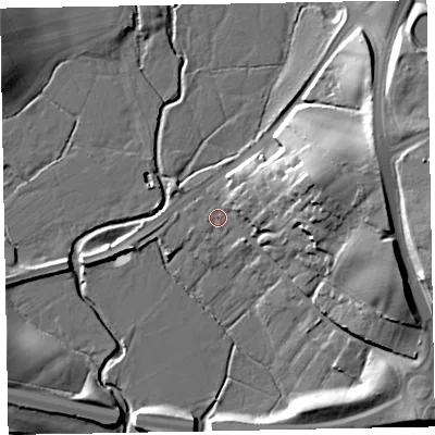 Shaded relief map of the ground around EX52NG, computed from Environment Agency LiDAR. The ground here sits at about 9 m above sea level and falls 22 m across the surrounding 800 m. Surface water reaching this point runs off ground lying to the east-north-east, 10.8 m higher.