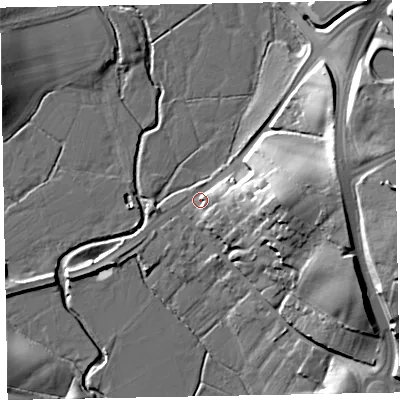 Shaded relief map of the ground around EX52NH, computed from Environment Agency LiDAR. The ground here sits at about 10 m above sea level and falls 23 m across the surrounding 800 m. Surface water reaching this point runs off ground lying to the east, 7.9 m higher.