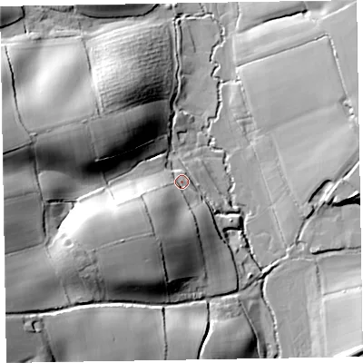 Shaded relief map of the ground around EX52RS, computed from Environment Agency LiDAR. The ground here sits at about 69 m above sea level and falls 45 m across the surrounding 800 m. Surface water reaching this point runs off ground lying to the south-west, 21.1 m higher.