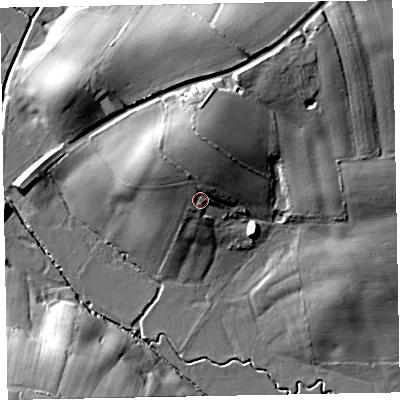 Shaded relief map of the ground around EX53AF, computed from Environment Agency LiDAR. The ground here sits at about 22 m above sea level and falls 26 m across the surrounding 800 m. Surface water reaching this point runs off ground lying to the north, 6.8 m higher.