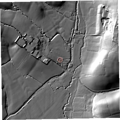 Shaded relief map of the ground around EX53DH, computed from Environment Agency LiDAR. The ground here sits at about 33 m above sea level and falls 40 m across the surrounding 800 m. Surface water reaching this point runs off ground lying to the west-north-west, 5.1 m higher.