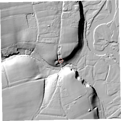 Shaded relief map of the ground around EX55DU, computed from Environment Agency LiDAR. The ground here sits at about 26 m above sea level and falls 21 m across the surrounding 800 m. Surface water reaching this point runs off ground lying to the north-north-west, 12.1 m higher.