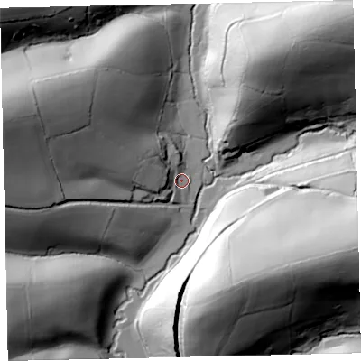 Shaded relief map of the ground around EX67BA, computed from Environment Agency LiDAR. The ground here sits at about 71 m above sea level and falls 72 m across the surrounding 800 m. Surface water reaching this point runs off ground lying to the west-north-west, 20.7 m higher.