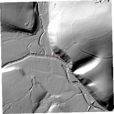 Shaded relief map of the ground around EX67HF, computed from Environment Agency LiDAR. The ground here sits at about 60 m above sea level and falls 103 m across the surrounding 800 m. Surface water reaching this point runs off ground lying to the east-north-east, 96.6 m higher.