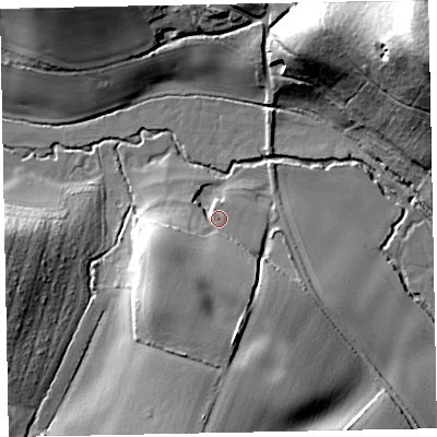 Shaded relief map of the ground around EX68JR, computed from Environment Agency LiDAR. The ground here sits at about 11 m above sea level and falls 52 m across the surrounding 800 m. Surface water reaching this point runs off ground lying to the south-west, 11.8 m higher.