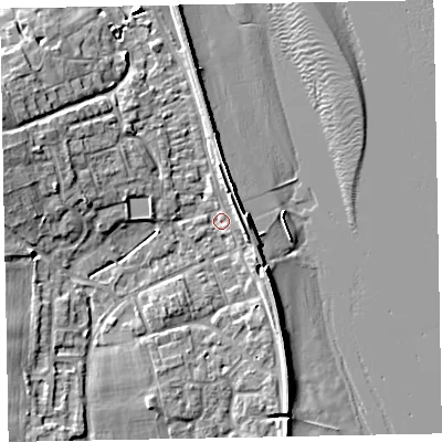 Shaded relief map of the ground around EX68NY, computed from Environment Agency LiDAR. The ground here sits at about 2 m above sea level and falls 10 m across the surrounding 800 m. Surface water reaching this point runs off ground lying to the west-north-west, 6.9 m higher.