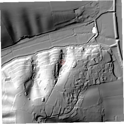 Shaded relief map of the ground around EX68RN, computed from Environment Agency LiDAR. The ground here sits at about 13 m above sea level and falls 64 m across the surrounding 800 m. Surface water reaching this point runs off ground lying to the south-south-west, 51.0 m higher.