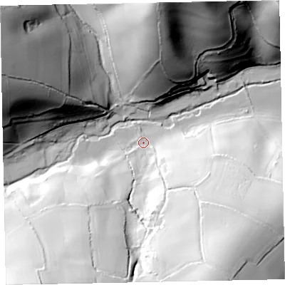 Shaded relief map of the ground around EX70QB, computed from Environment Agency LiDAR. The ground here sits at about 65 m above sea level and falls 75 m across the surrounding 800 m. Surface water reaching this point runs off ground lying to the south-south-east, 64.1 m higher.