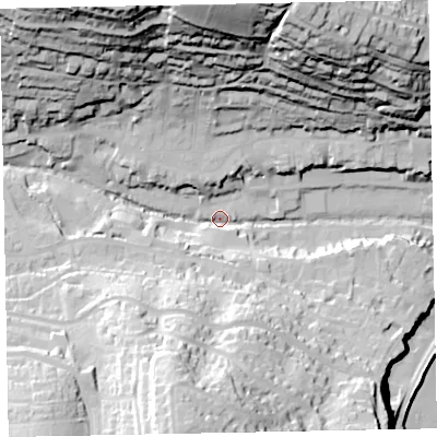 Shaded relief map of the ground around EX79DA, computed from Environment Agency LiDAR. The ground here sits at about 9 m above sea level and falls 76 m across the surrounding 800 m. Surface water reaching this point runs off ground lying to the north-north-west, 64.3 m higher.