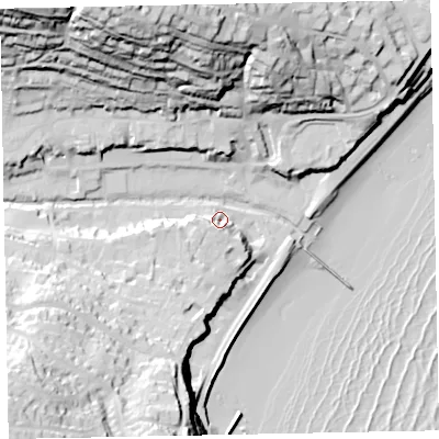 Shaded relief map of the ground around EX79PE, computed from Environment Agency LiDAR. The ground here sits at about 6 m above sea level and falls 70 m across the surrounding 800 m. Surface water reaching this point runs off ground lying to the south, 9.7 m higher.