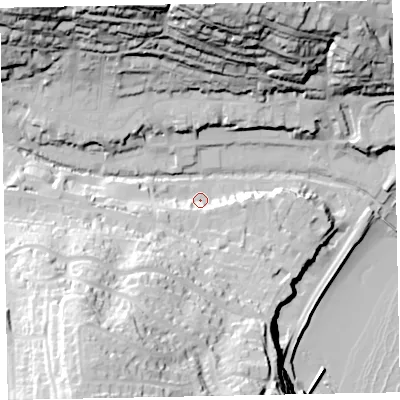 Shaded relief map of the ground around EX79PZ, computed from Environment Agency LiDAR. The ground here sits at about 9 m above sea level and falls 69 m across the surrounding 800 m. Surface water reaching this point runs off ground lying to the south-west, 24.2 m higher.
