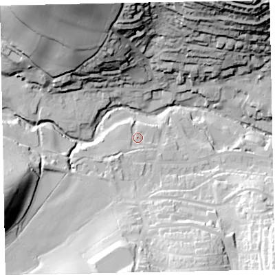 Shaded relief map of the ground around EX79QS, computed from Environment Agency LiDAR. The ground here sits at about 23 m above sea level and falls 70 m across the surrounding 800 m. Surface water reaching this point runs off ground lying to the south, 26.1 m higher.