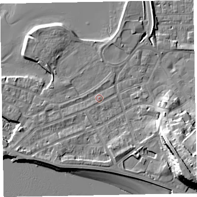 Shaded relief map of the ground around EX81DW, computed from Environment Agency LiDAR. The ground here sits at about 4 m above sea level and falls 23 m across the surrounding 800 m. Surface water reaching this point runs off ground lying to the south-west, 2.6 m higher.