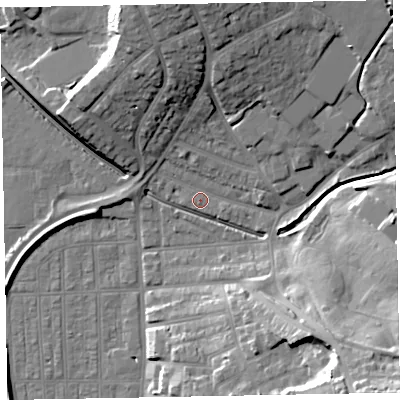 Shaded relief map of the ground around EX83DS, computed from Environment Agency LiDAR. The ground here sits at about 4 m above sea level and falls 29 m across the surrounding 800 m. Surface water reaching this point runs off ground lying to the north-north-west, 2.8 m higher.